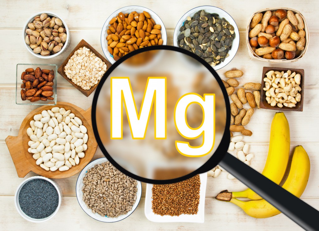Collection natural products containing magnesium - pumpkin seeds, poppy seed, cashew nuts, beans, raw cocoa beans, almonds, sunflower seeds, oatmeal. buckwheat, peanuts, hazelnuts, pistachios, banana